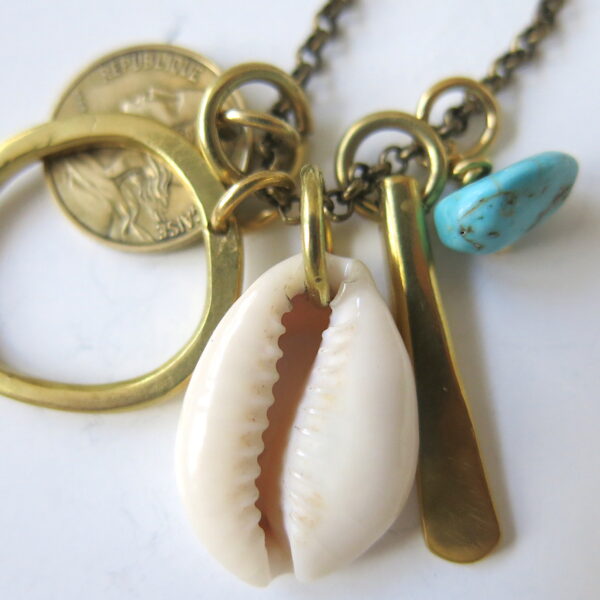 Lange Halskette mit Ring & Muschel
